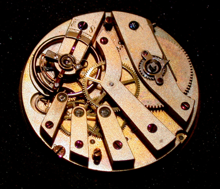 The top of the bar movement showing the parachute shock absorber on the balance jewel The top of the bar movement showing the parachute shock absorber on the balance jewel