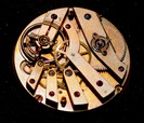 The top of the bar movement showing the parachute shock absorber on the balance jewel